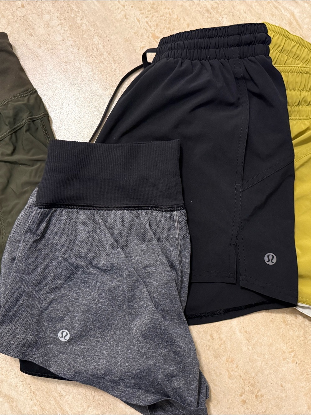 4 lululemon woman shorts.Black,Gray,green Athletic Shorts. Great price!!